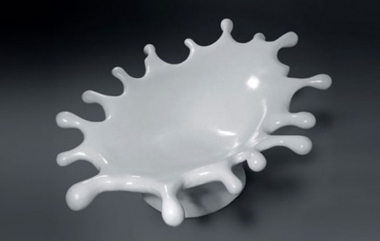 a white splash chair with drops is a cool and creative idea for a modern space, it will bring a touch of fun to the room