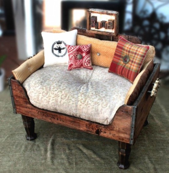 a rich-stained drawer put on legs, with a cushion and some pillows is a lovely idea for a rustic home