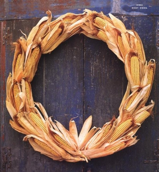 a rustic fall wreath of corn husks and corn cobs is a cute and lovely idea to decorate your outdoor space this season, it looks very nice