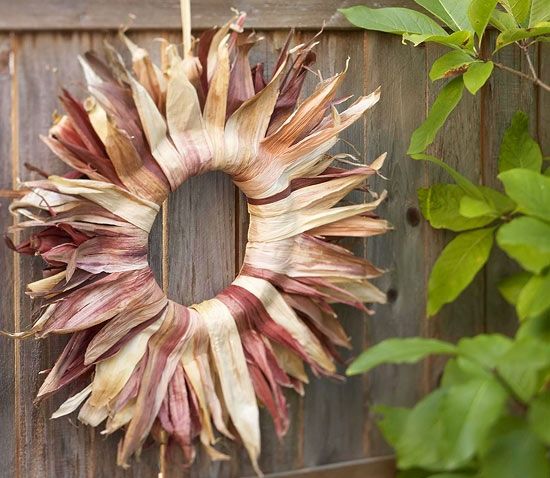 a natural color dired corn husk wreath will be a great decoration for a rustic outdoor space, whether it's your door or not