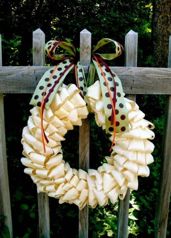 such a bent corn husk wreath with a colorful printed bow will be a great idea for a fall space