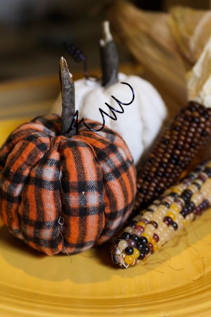 plaid and white fabric pumpkins with wooden stems will be great and simple decorations for the fall and you can DIY them fast