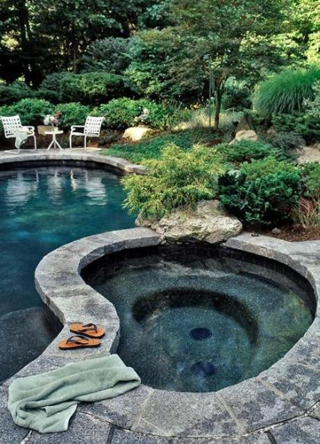 Stone is a great material for pools and outdoor jacuzzis because it blends with surroundings really well.