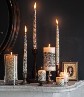 candles decorated with black lace are amazing for Halloween decor, they are chic, refined and beautiful and will make your space refined