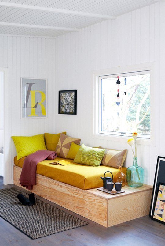 a platform bed is easy to build and hides some storage space