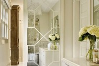 a chic mirror sliding door with geometric patterns for ultimate elegance