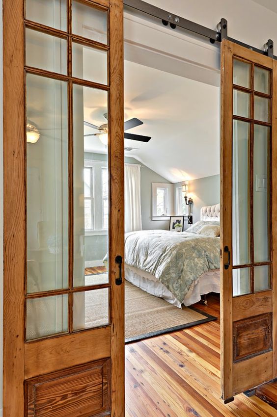 wood and glass sliding doors in a light shade for a rustic and cozy touch