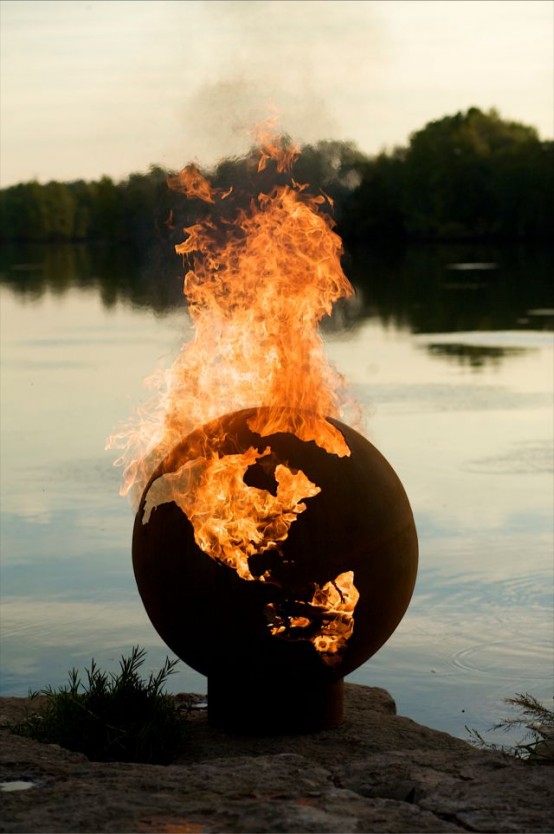 a jaw-dropping planet-shaped fire bowl with continent cutouts where the fire goes looks extremely spectacular and extra bold