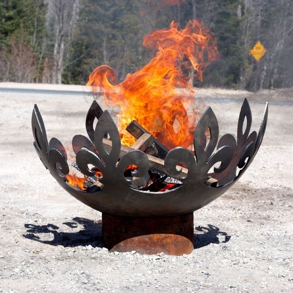 an eye catchy and refined patterned metal fire bowl like this one will fit a vintage inspired outdoor space