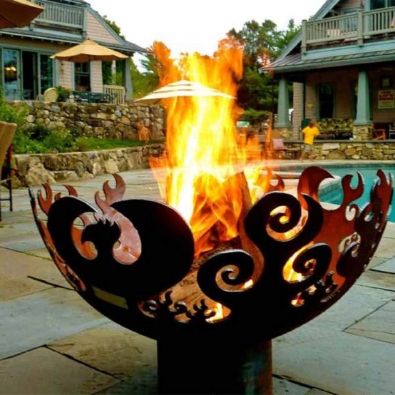 a unique metal fire bowl portraying flames is a gorgeous idea for outdoors, it brings interest to the space