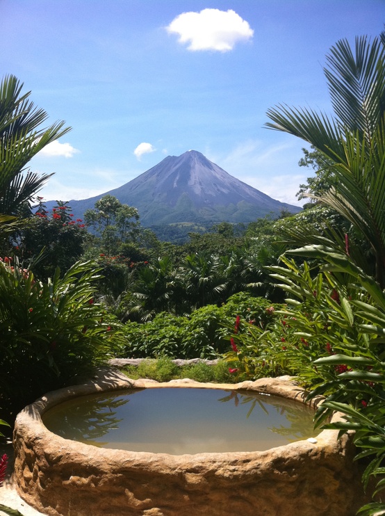 a jacuzzi with a fantastic tropical forest and mountain view is a gorgeous space to relax in, it's a perfect holiday spot