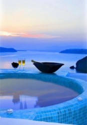 a blue jacuzzi with a lovely sea view and a sunset is a fantastic idea to relax and enjoy beauty of nature