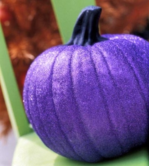 a purple glitter pumpkin is a nice decoration for Halloween and it's very easy to make yourself