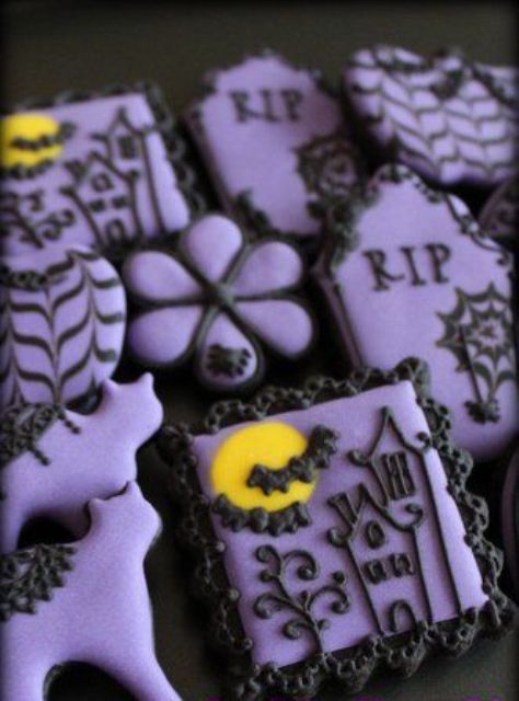 purple and black Halloween cookies are a perfect dessert for a party or can be given as favors at this party