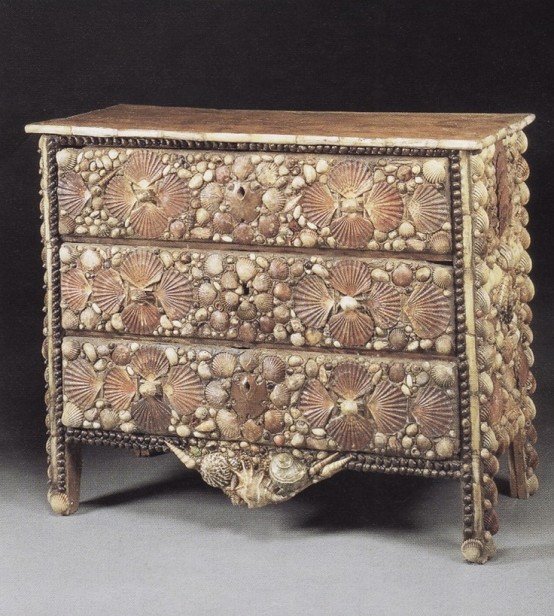 a vintage sideboard clad with seashells of various sizes looks stylish and lovely