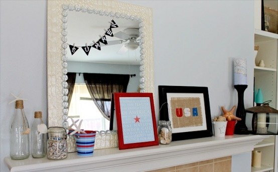 a nautical mantel with starfish, signs, starfish, candles, seashells and candle lanterns