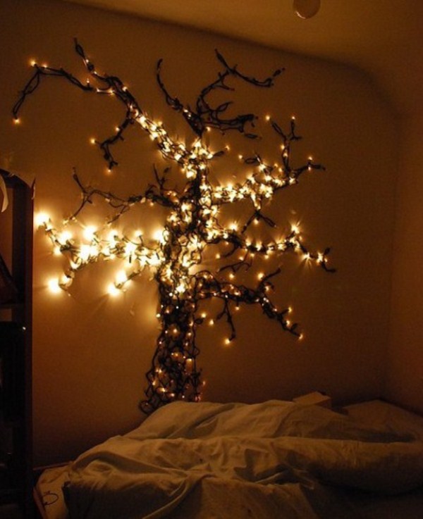 a fantastic tree of lights created right on the wall is a modern and fresh idea and after Christmas it can be left here as decor