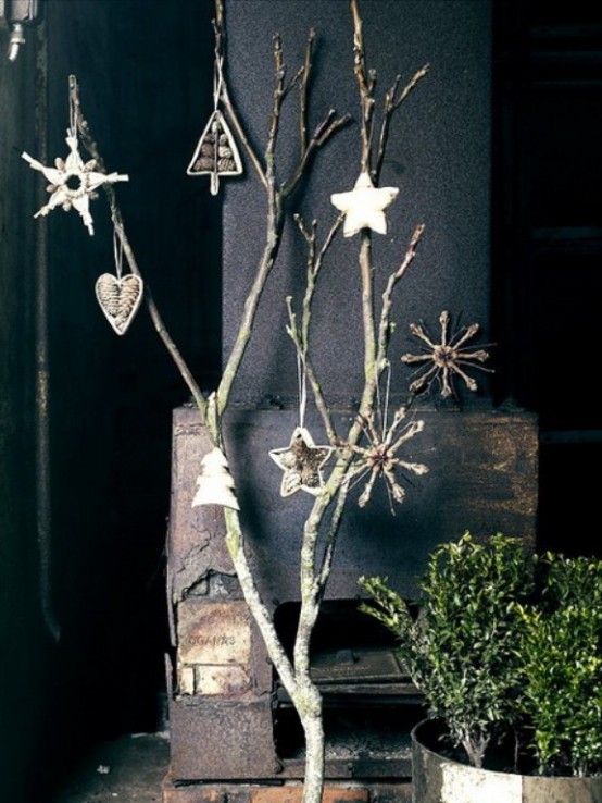 branches decorated with various Scandinavian ornaments can be a nice idea of a Christmas tree