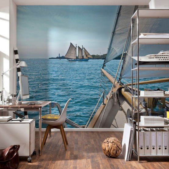 a contemporary home office with a large sea and ship wall mural that inspires and reminds of oceans and beaches