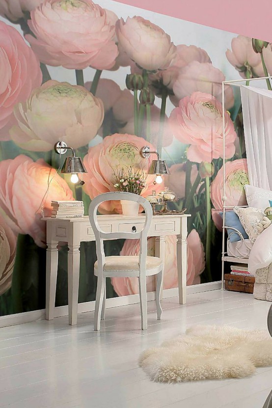 a girlish bedroom and home office with a large natural pink ranunculus wall mural that takes over the whole space
