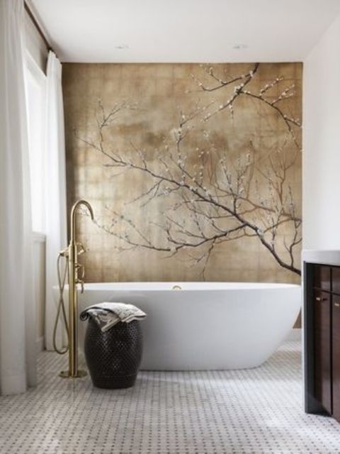 a neutral bathroom with a catchy sakura wall mural that brigns romance and chic to the space