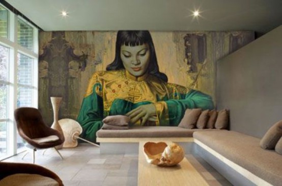 a contemporary living room with a bold and catchy woman wall mural in bright shades