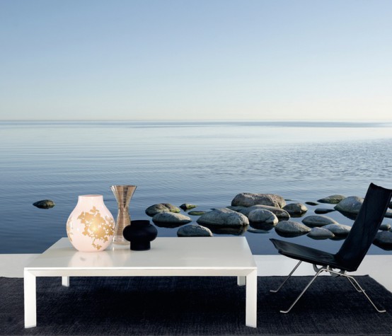 a contemporary nook with black and white furniture and a coastal wall mural that helps you relax and enjoy every moment