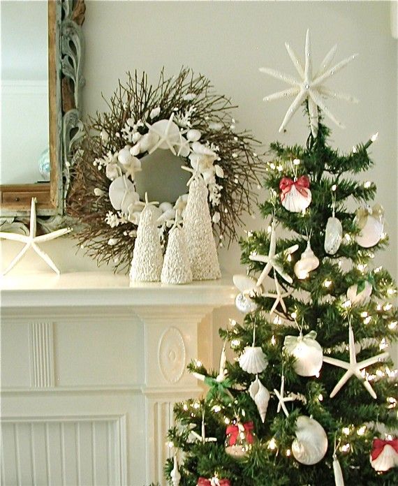 a twig Christmas wreath with pearls, seashells and starfish, a Christmas tree with lights, seashells and starfish are amazing for Christmas