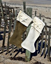 simple burlap stockings with star fish attached are amazing for outdoor Christmas decor and will do for indoor, too