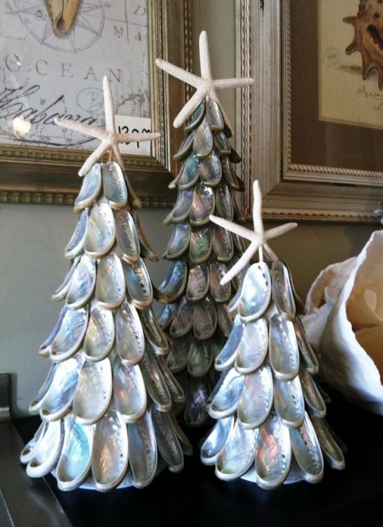 mini Christmas trees of seashells and with starfish on top is a lovely combo to rock in a beach home