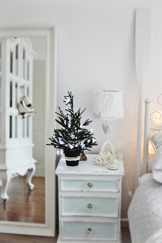 a beach Christmas tree decorated with small clay starfish is a beautiful idea to style your space for holidays