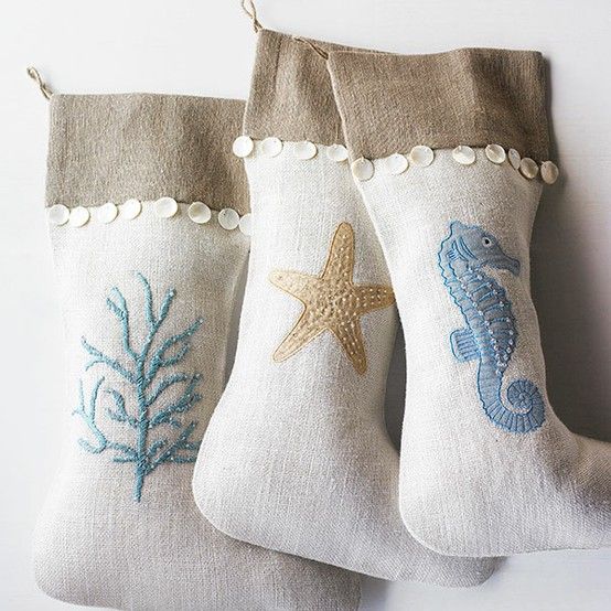 neutral beach Christmas stockings with embroidered corals, starfish and a sea horse are amazing for Christmas decor