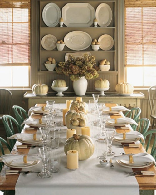 neutral pumpkins, painted pears and neutral pillar candles will give a refined fall touch to the dining room