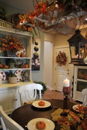 lots of faux fall leaves and pumpkins plus moss balls are ideal for the fall and will last long