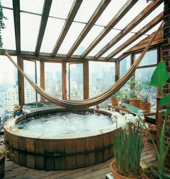 a hot tub in a sunroom is a cool idea