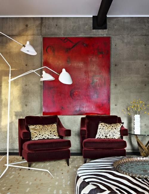 burgundy velvet chairs and a statement red artwork for a bold look in your living room or bedroom
