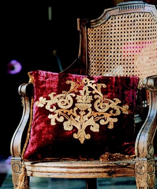 add chic burgundy velvet and gold embroidery pillows to your space for an easy touch of color