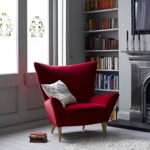 a statement contemporary burgundy chair will add a cool colorful touch to your space