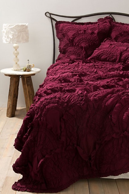 lush burgundy bedding is a great way to bring a fall mood to your bedroom