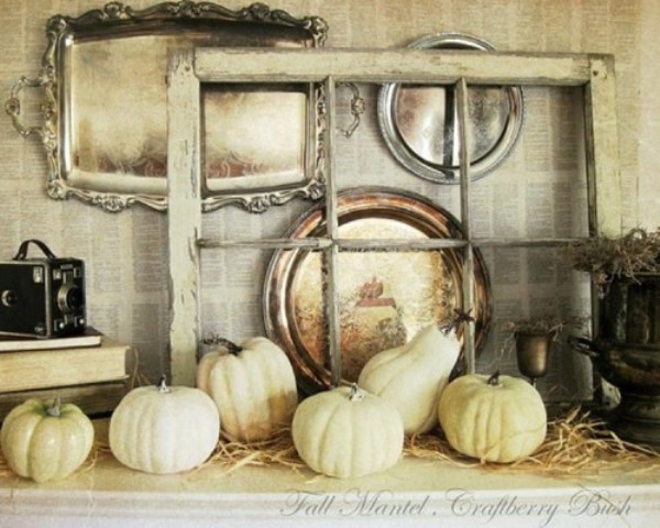 a vintage fall mantel with neutral pumpkins, hay, a vintage window frame, trays, vintage cameras