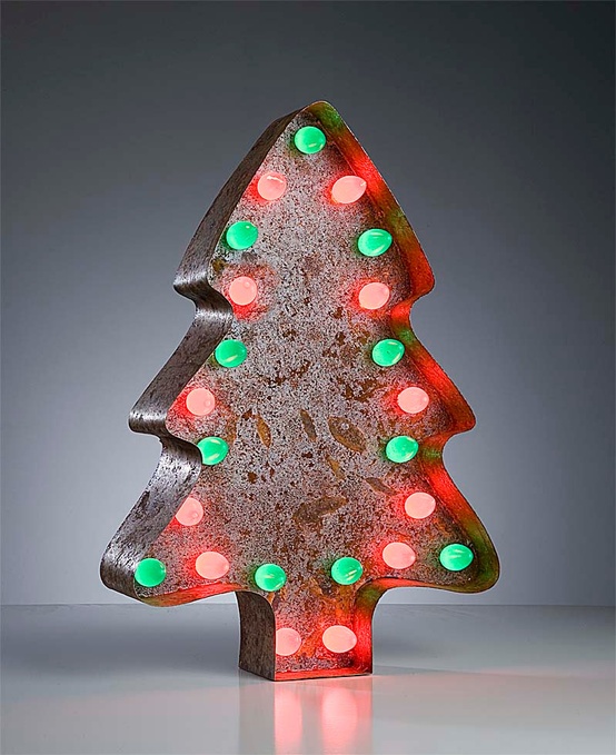 a vintage cookie cutter could become a cool tabletop tree if you add some small light in it