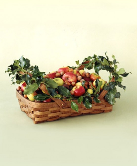 a basket with apples, berries, greenery and fresh fruits is a very easy and truly natural centerpiece idea for Thanksgiving