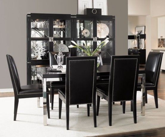 a chic and refined dining room with a glass buffet, a black dining table and chairs is a strict and elegant space