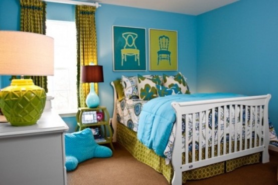 a bold turquoise guest bedroom with a white bed and turquoise and printed bedding, a white dresser, mustard curtains and bold artwork