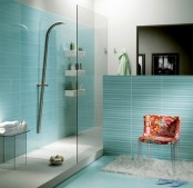 turquoise tiles and floors plus neutral touches for a minimalist and laconic bathroom