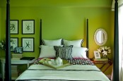 neon green walls, dark stained and white furniture, tropical blooms and a mother-of-pearl mirror