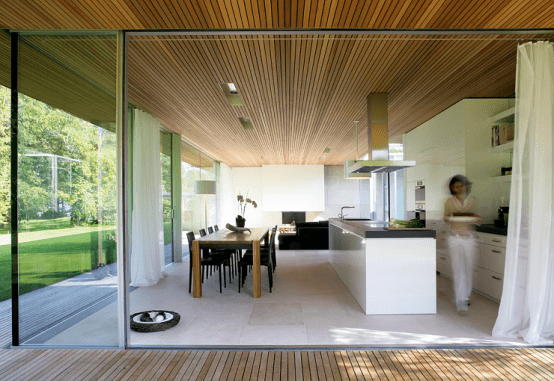 A Bungalow Made Of Wood And Glass