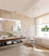 a modern tan-colored bathroom with a floating open shelf vanity, a large mirror, a shower space and a bathtub by the window