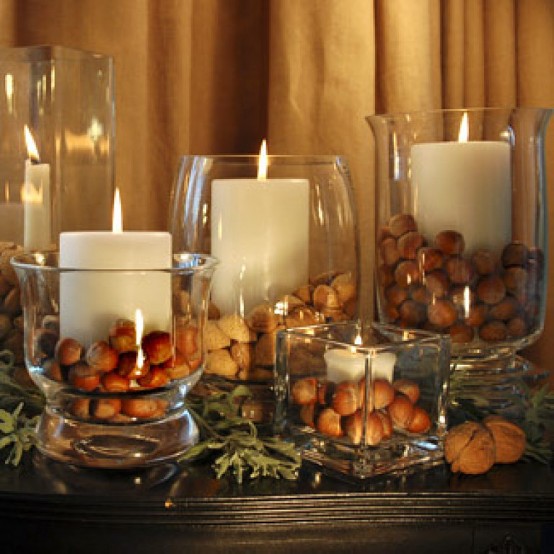 glass jars with nuts and pillar candles are great for both fall and winter decor and will do for Thanksgiving and Christmas