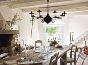 a stylish dining room with French doors leading outside